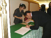 Signing the guest book